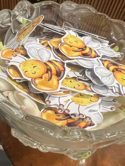 A collection of adorable honeybee-themed cutouts for a "Baby in Bloom" or "Mommy to Bee" shower.