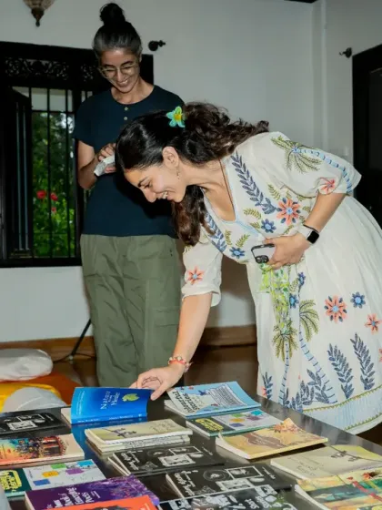 The quiet joy of discovering a new book at our Kavi Mane Utsav book swap corner. Our events are about more than just performance; they are about celebrating all aspects of literary culture.