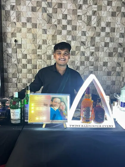 My setup for Sheldon and Emilia's party, featuring our LED-forming display and a selection of premium liquors. We ensure the bar looks as good as the drinks taste.