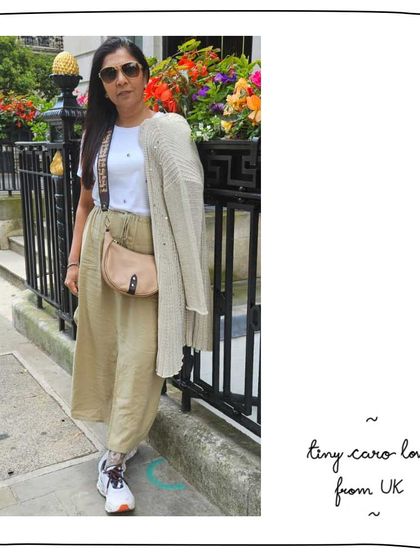 Deepa slaying her look in the UK with a Tiny Caro in Nude leather, paired with a custom triple-woven wide sling.