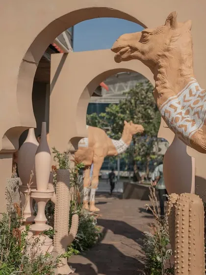 We transformed an open space into a stunning Desert Oasis for a Haldi ceremony, complete with life-sized camel props and custom arches, creating an unforgettable themed entrance for guests.