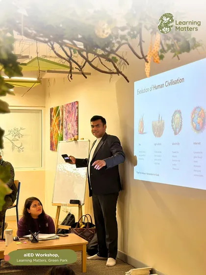 Our workshop facilitator discusses the evolution of civilization, using visuals to connect historical progress with modern educational challenges. This approach helps frame the importance of adapting our teaching methods for the future.