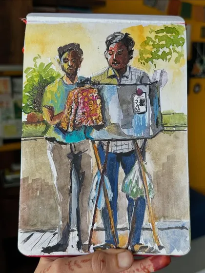 A watercolor sketch of Sanjay bhaiya and his bhel puri stall, a fixture from my childhood. Capturing these everyday people and their stories is the heart of my art. It’s these simple, joyful moments that I want to help you see and sketch in your own life.