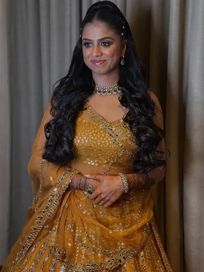 A portrait of the bride ready for her Sangeet. The airbrush makeup ensures she looks fresh and glamorous all night long.