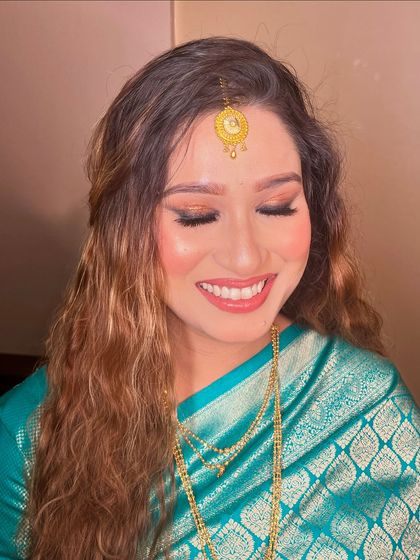 A radiant smile from this beautiful mom-to-be. The makeup for her baby shower was all about enhancing her natural glow.