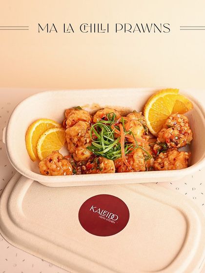 My Ma La Chili Prawns, for those who love the heat. These juicy prawns are tossed in a spicy and numbing Sichuan Ma La sauce, garnished with fresh orange slices.