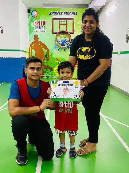 Darsh Jindal is our 'Most Valuable Kid of the Month'. Here he is with his coach and mom, proudly holding his certificate.