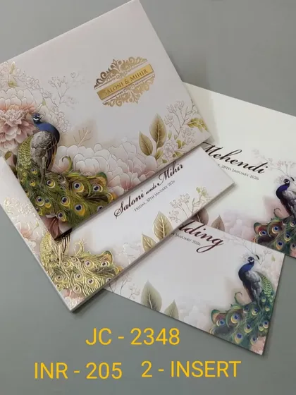 A beautiful peacock with a full, flowing tail is the centerpiece of this elegant invitation. The soft pastel background and delicate floral details make this a popular design for both modern and traditional ceremonies.