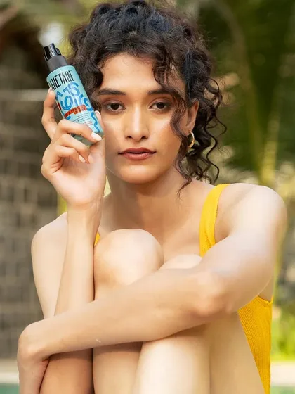 This look emphasizes natural, sun-flushed skin that encompasses the spirit of summer. The makeup is minimal, focusing on a healthy and radiant complexion.