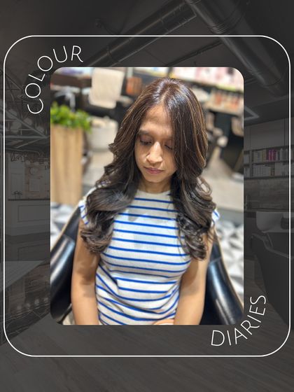 Another shot from our "Colour Diaries," this time a frontal view showing how the soft layers and rich color frame the client's face.