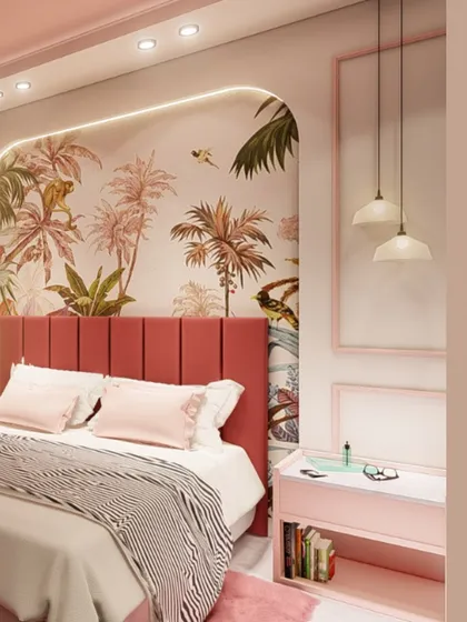 A close-up of the tropical-themed accent wall in the pink children's bedroom. The vibrant wallpaper and custom upholstered headboard create a focal point that is full of personality and charm.