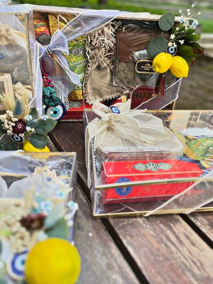 Another angle of the trousseau display, showing how the different elements and heights create a visually interesting and abundant presentation for the Roka ceremony.