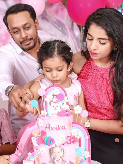 A thrilling 'PJ Masks' themed birthday party, with character cutouts, a cityscape backdrop, and blue and green balloons, ready for a night of adventure.