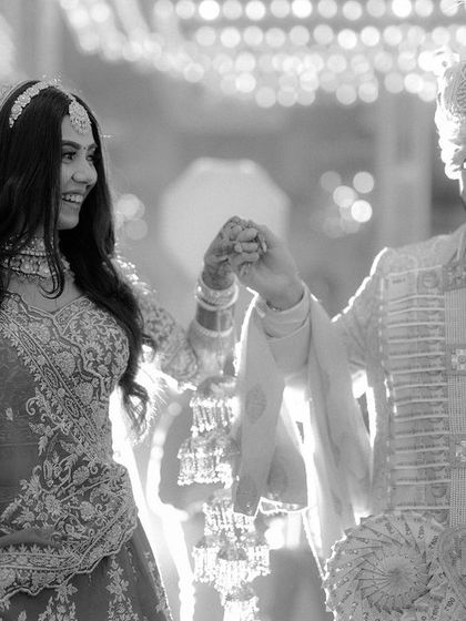 A beautiful black and white shot of Nandika and Kunal's wedding ceremony. The candid nature of the photo captures a real moment of connection and happiness.