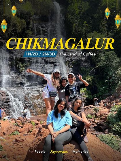 A group of women sits happily by a waterfall in Chikmagalur, the Land of Coffee. My trips are about finding these beautiful spots to relax and have fun.