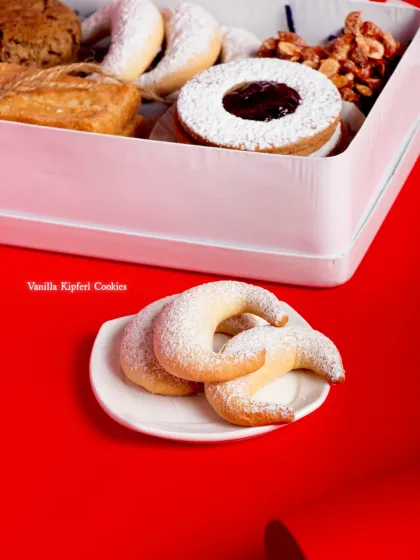 The crescent-shaped Vanilla Kipferl Cookies from our tin, a delicate and buttery Austrian classic.
