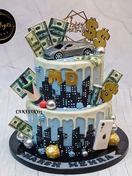 A stylish two-tier "Boss Theme" birthday cake. This 3kg chocolate cake is decorated with a city skyline, edible money, a toy car, and an iPhone figure.