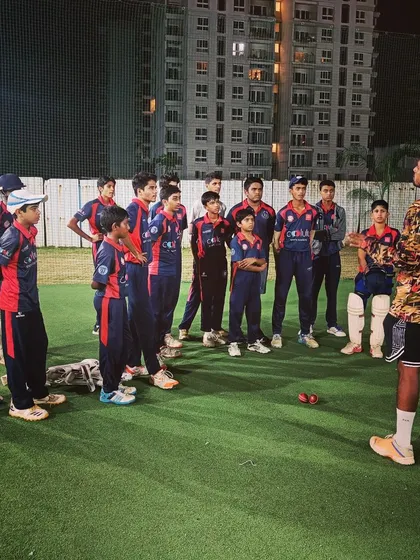 "Play like winners, act like winners, be winners." A coach delivers a pre-game talk to our cricket team during an off-season training session, focusing on strategy and motivation.