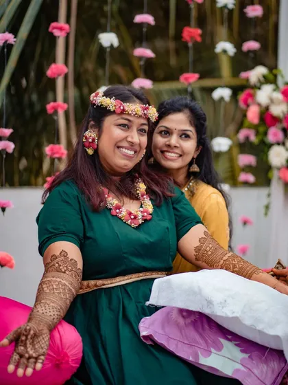 Happy clients make the prettiest pictures. A candid moment of laughter and joy at a mehndi ceremony.