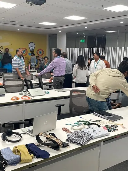 Participants at a leading global software firm engage in an interactive exercise during an Image Management training session. Hands on activities are key to helping teams internalize concepts around professional dressing and grooming.