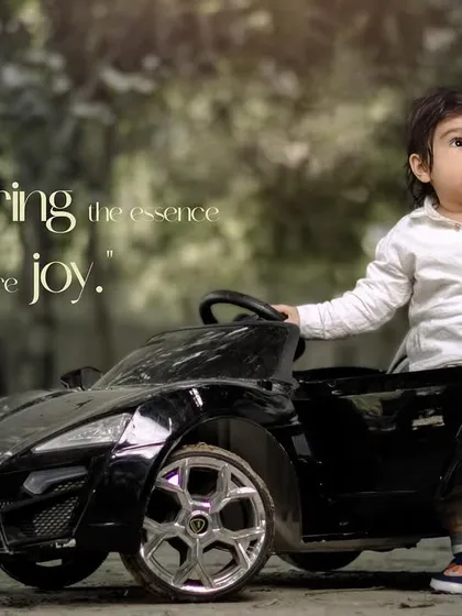 Capturing the essence of pure joy. Another angle of a toddler and his toy car, ready for adventure.