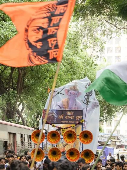 The Kopri Cha Samrat procession making its way through the streets of Thane, with traditional flags flying high.