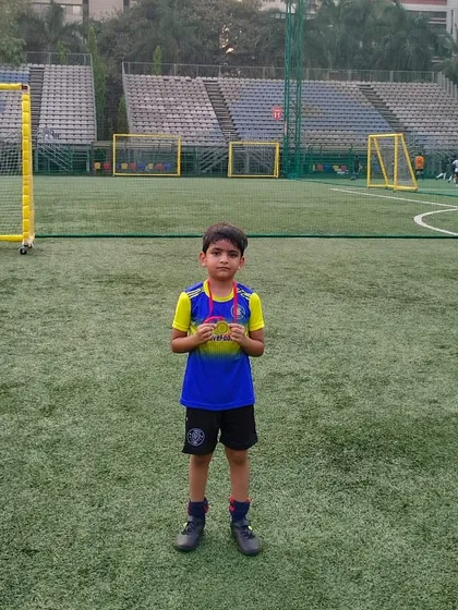 Standing tall with his Player of the Month medal. A proud moment for him and for us.