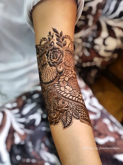 Another angle of the bridal start-up, showcasing the bold rose and intricate surrounding patterns.