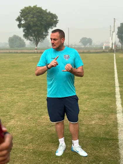 Coach Efe from Dubai's The Football Academy during the trial event. We are proud to connect our players with global football networks.