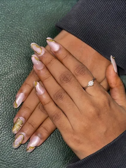 The beauty is in the details. This shot highlights the intricate application of the gold foil on each nail, giving a sophisticated and celebratory feel. Whether you want something subtle or bold, I can create the perfect set for you.