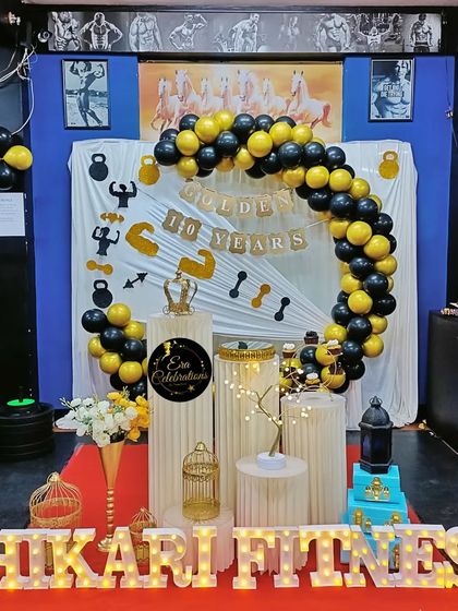 A full view of the 'Shikari Fitness' 10th-anniversary decoration, showing the complete setup within the gym space.