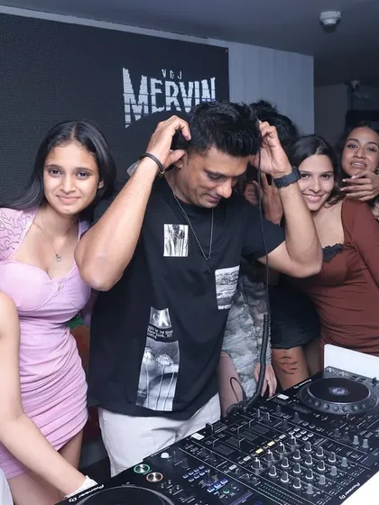 The party doesn't stop at the console. I love it when the crowd gets involved and shares the energy right from the DJ booth.