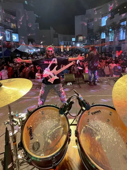 Our guitarist owning the stage with the entire Ernst & Young crowd in the background. This was an outdoor gig with an insane vibe.