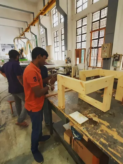 Students in the workshop work on their final diploma projects, applying the skills they've learned over the course of the program.