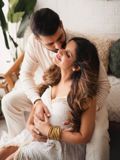 a sweet kiss for the glowing mamma. This is such a tender and loving moment, perfectly captured.