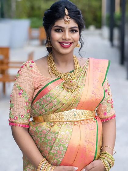 A beautiful portrait of Sukrutha from her baby shower. I focused on creating a flawless, glowing base and a warm lip color to enhance her pregnancy glow.