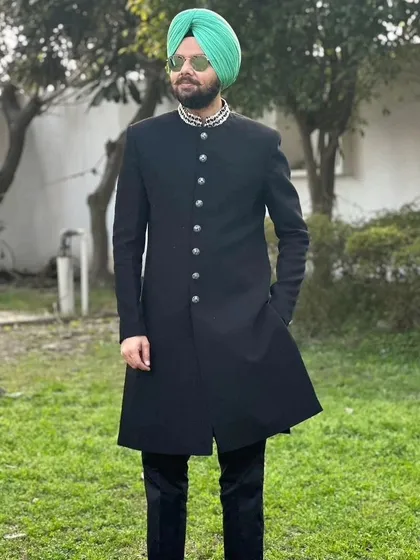 Stand-up comedian Jaspreet Singh shows off his style in our black asymmetrical Indo-western sherwani. It’s the perfect blend of traditional design and modern flair.