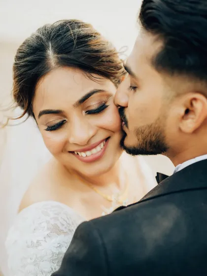 A sweet and intimate moment between the bride and groom.