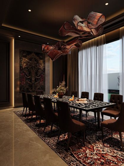 This dining area concept is designed to be immersive and luxurious. A sculptural light fixture hangs over a striking dining table, while a richly textured carpet and bold artwork create a dramatic, moody atmosphere for entertaining.