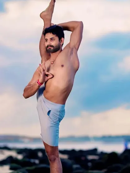Advanced asanas are not just about flexibility; they are a form of meditation in motion. This posture requires balance, strength, and complete focus, demonstrating the harmony of mind and body that I teach in my advanced yoga courses.