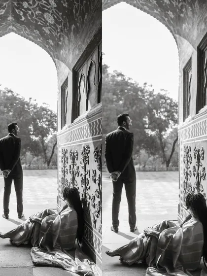 A timeless black and white composition, where the bride waits in a historic archway. This artistic shot plays with light, shadow, and emotion, creating a powerful narrative.