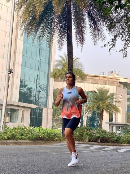A duplicate of image 163. Running through a beautiful tree-lined street in my Ultraboost Light shoes.
