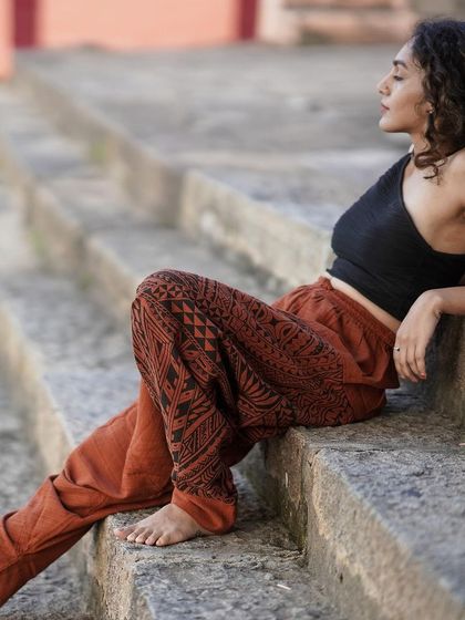This image, part of a campaign celebrating movement, shows me resting on ancient temple steps. It represents the timeless connection between our bodies, our culture, and the earth.