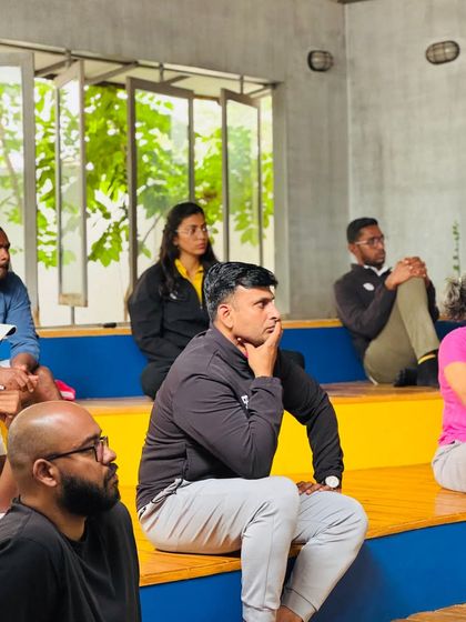 A close-up of my team during a learning session. The focus and engagement show their commitment to becoming the best mentors they can be.