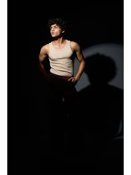 Another shot from the same series, playing with light and shadow. The minimal grooming ensures that the artistic lighting is the main focus.