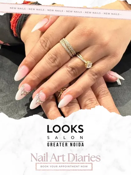 A perfect example of bridal nail artistry. These elegant almond-shaped extensions are finished with a classic French manicure base and accented with delicate 3D crystal embellishments for that extra sparkle on the big day.