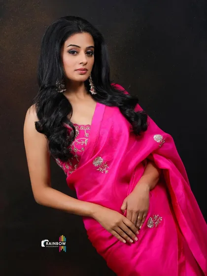 A full-length shot of Priyamani, emphasizing her poise and the elegance of the entire ensemble.