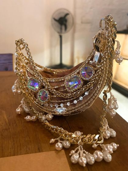 This Papa Don't Preach minaudière is a work of art. I love featuring maximalist, statement accessories from Indian designers that are bold and unconventional.