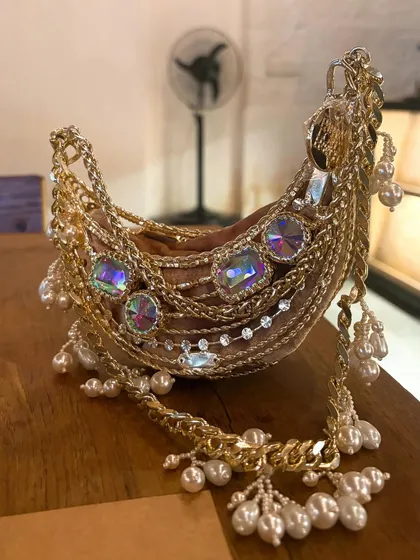 This Papa Don't Preach minaudière is a work of art. I love featuring maximalist, statement accessories from Indian designers that are bold and unconventional.