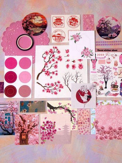A flatlay of the Cherry Blossom themed journaling kit, filled with beautiful pink floral designs and Japanese-inspired motifs.